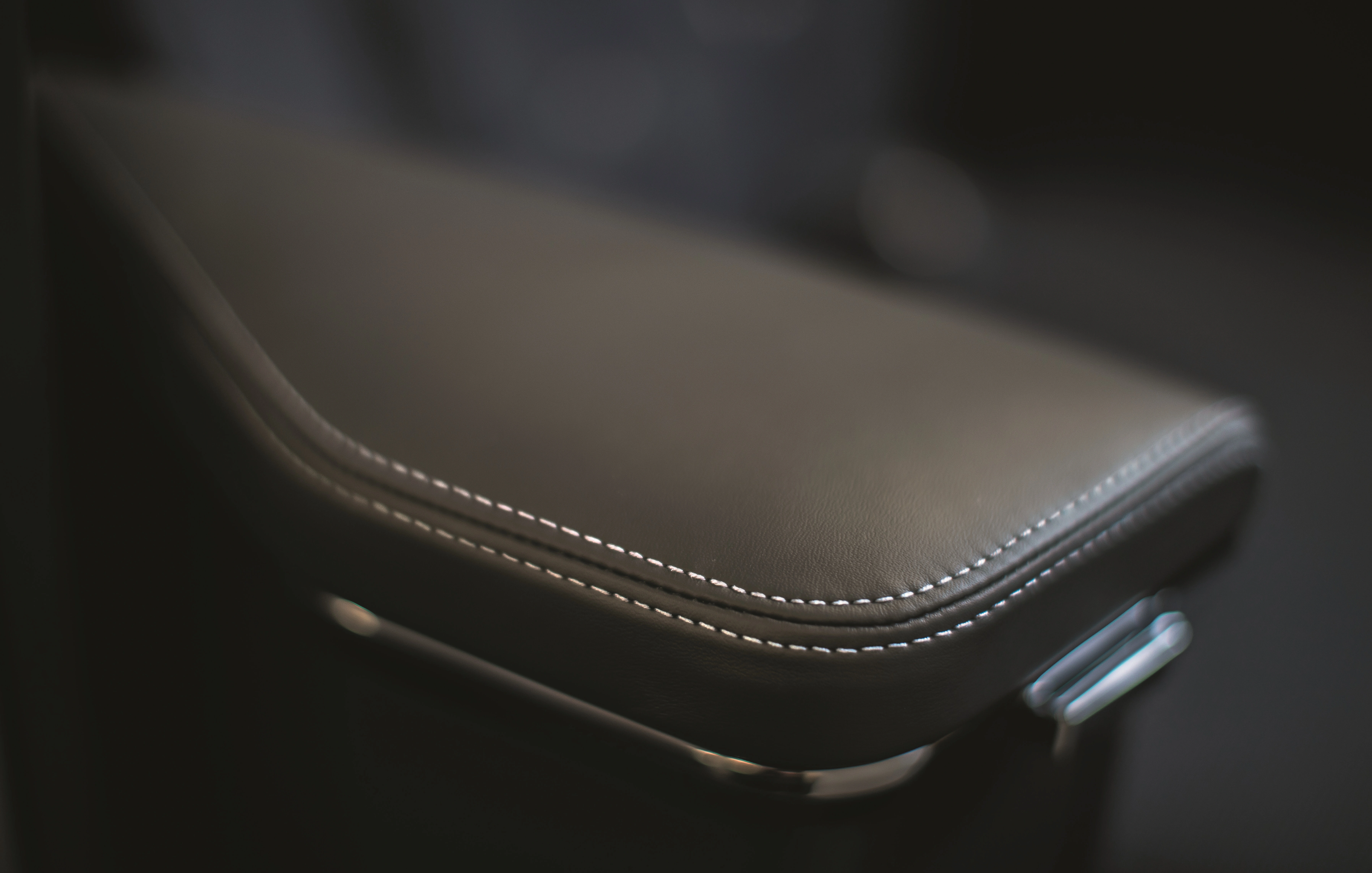 Photograph of the armrest on the BA club suite, which can be moved up and down