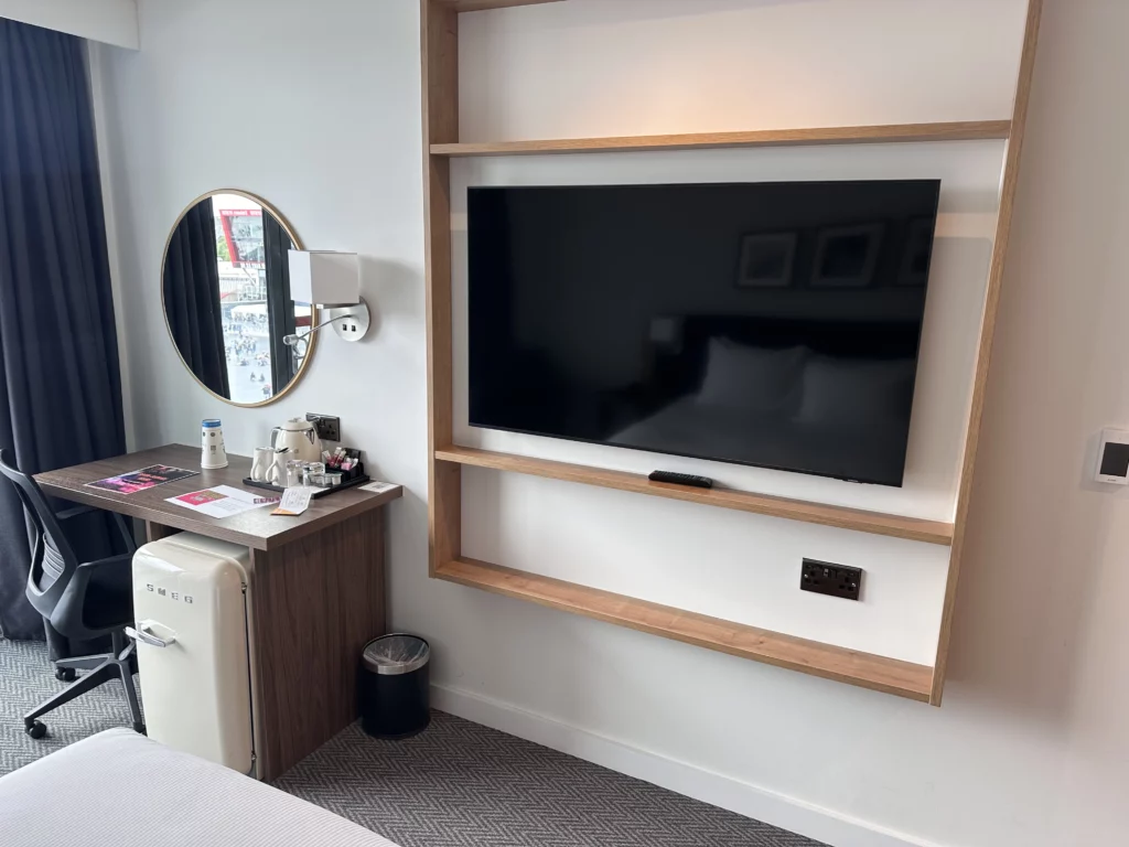 Hilton Garden Inn, Old Trafford - Photograph of the TV and desk