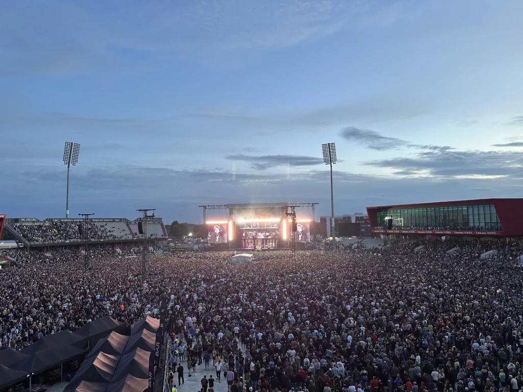 Photograph of a Green Day concert at Old Trafford, Manchester in June 2024, taken from the balcony of the Hilton Garden Inn