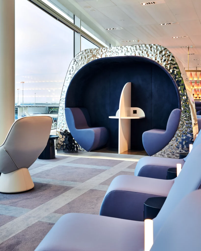 Photograph of seating areas in oneworld lounge in Amsterdam