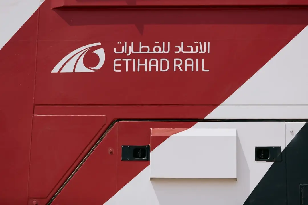 Photograph of the side of an Etihad Rail train