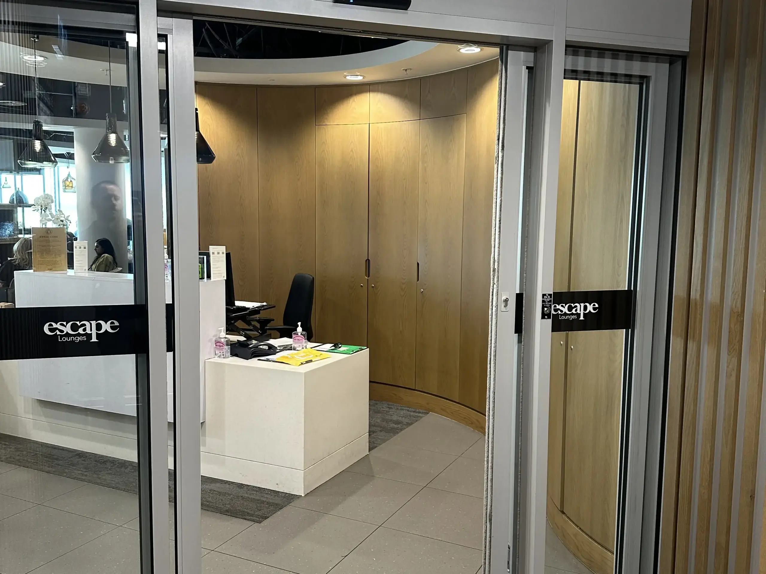 Photograph of the doorway that leads into the Escape Lounge at Manchester Airport, acting as the BA lounge