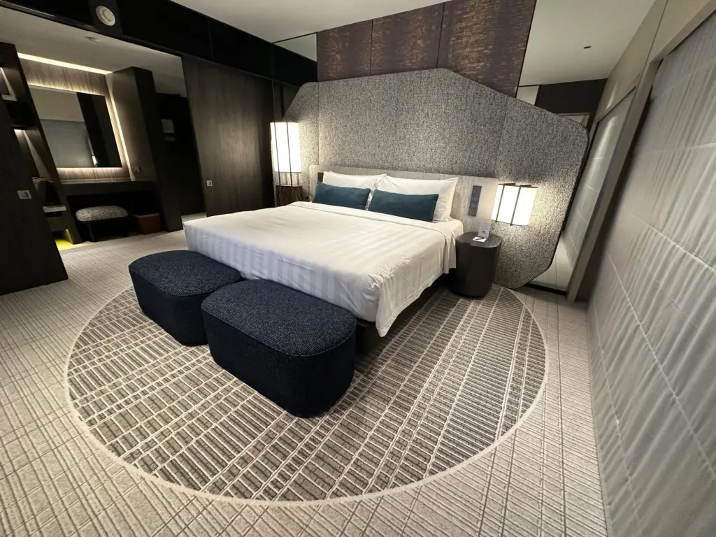 The spacious bedroom in the suite The spacious bedroom in the suite