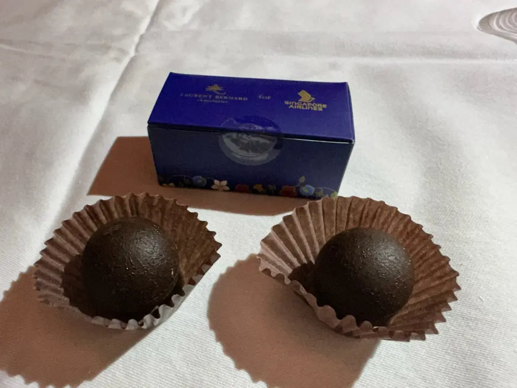 The mini box of chocolates given out after the meal