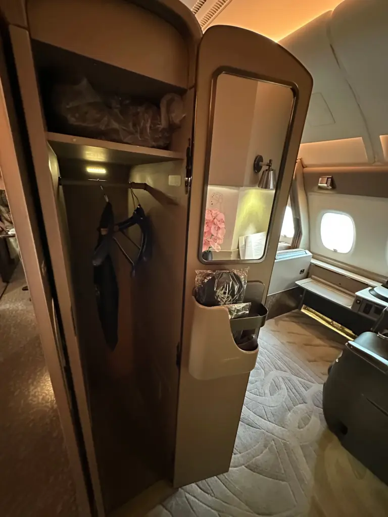 The wardrobe as you enter the suite Your slippers are stored in the door pocket