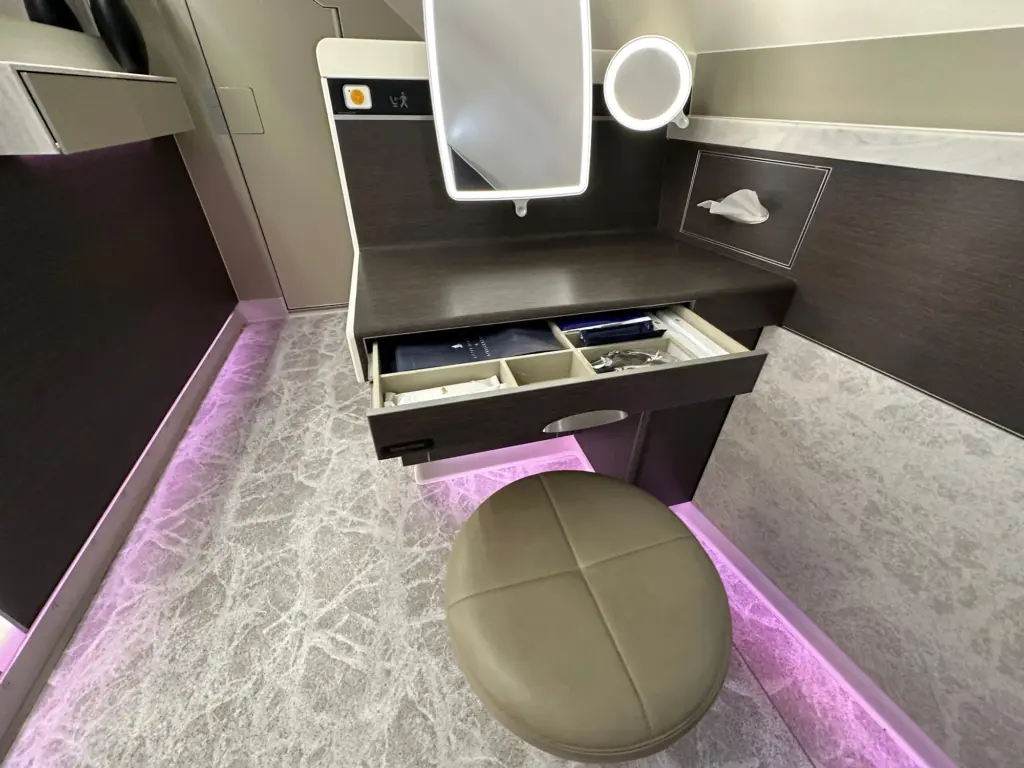 The dresser with the amenity drawer opened