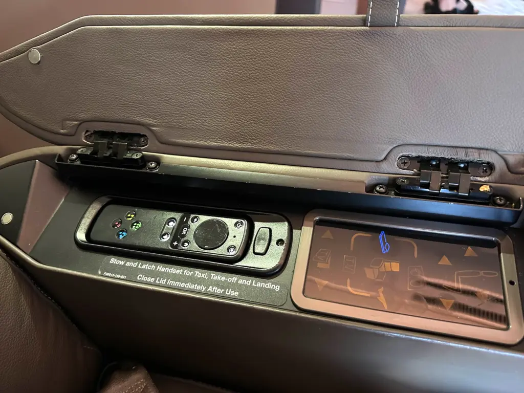 singapore first suite seat and ife controls