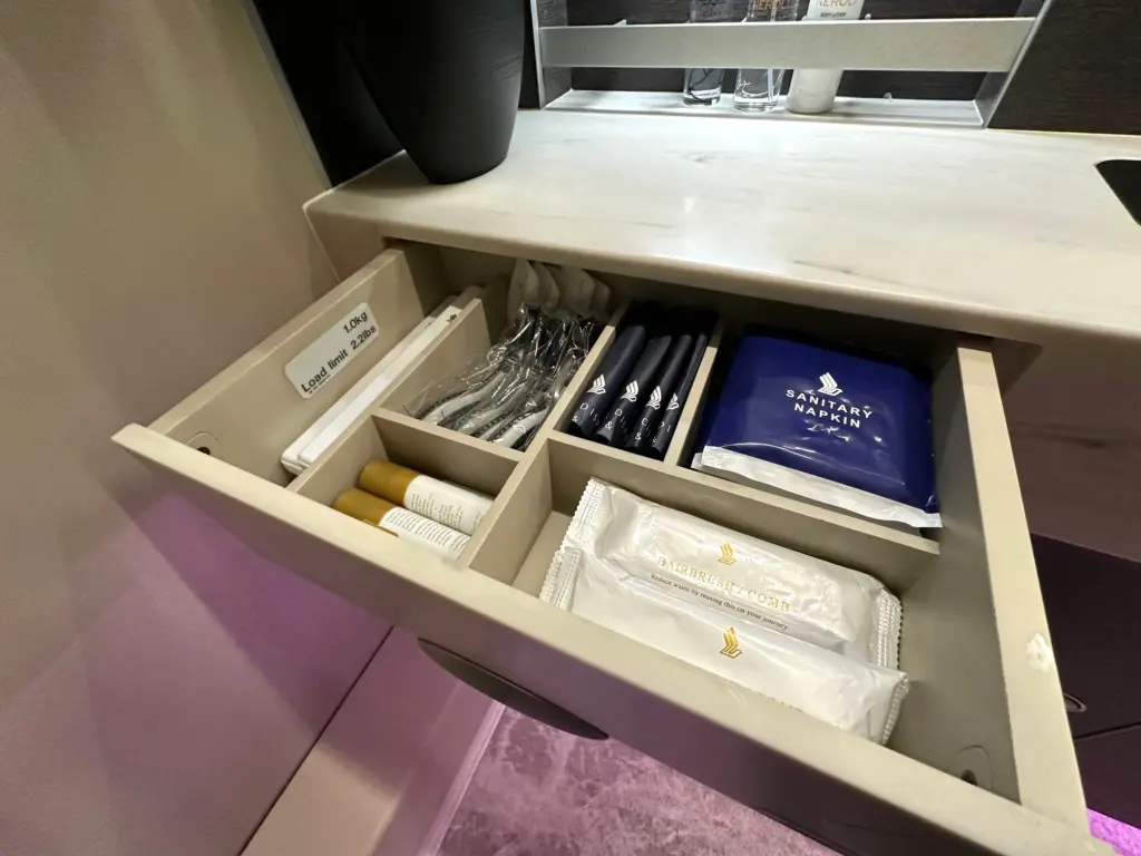 The amenity drawer in the smaller bathroom