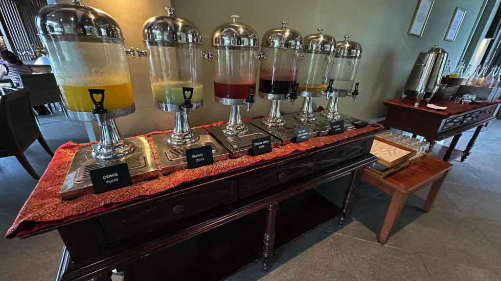 A wide selection of juices in the breakfast waiting area