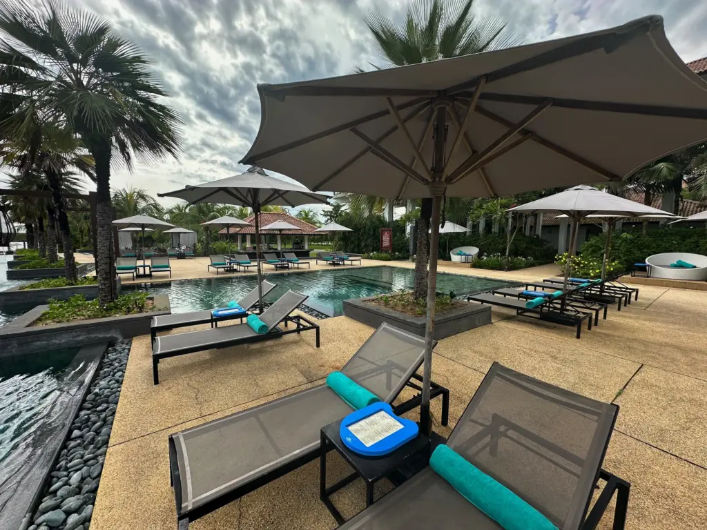 Sunbeds around the main pool