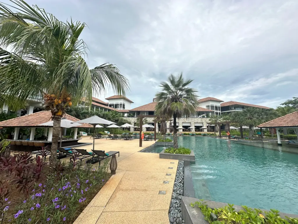 The main hotel buildings viewed from behind the primary pool