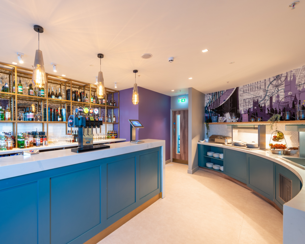 The manned bar and self service food counter in the Aspire