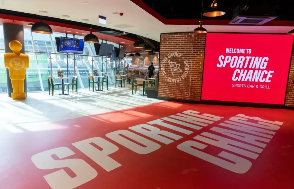 A photograph of the entrance way to the Sporting Chance bar at Manchester Airport