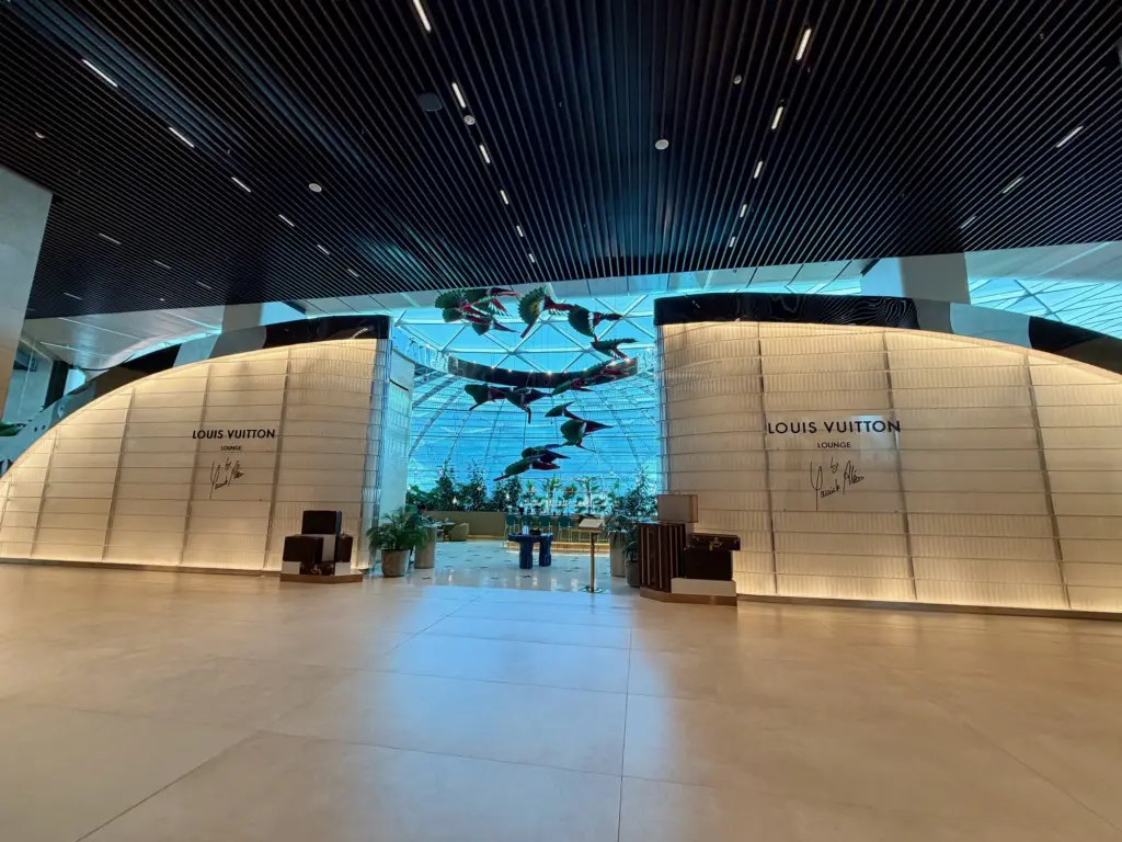 The entranceway to the Louis Vuitton lounge accessed from the main reception of the Qatar Garden Lounge The entranceway to the Louis Vuitton lounge accessed from the main reception of the Qatar Garden Lounge