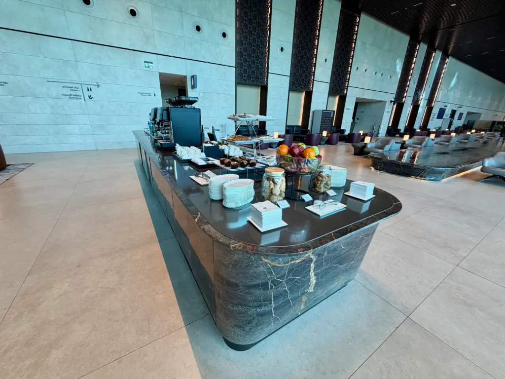 A self service food and drink station on the left hand side of the lounge A self service food and drink station on the left hand side of the lounge