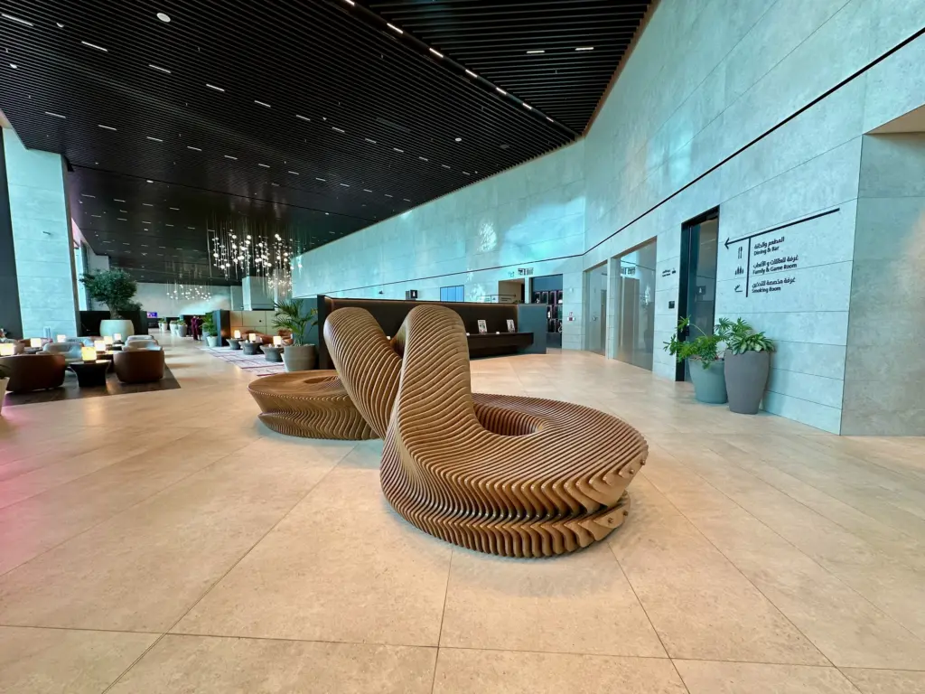A unique wooden sculpture and possibly a seat in the lounge reception A unique wooden sculpture and possibly a seat in the lounge reception
