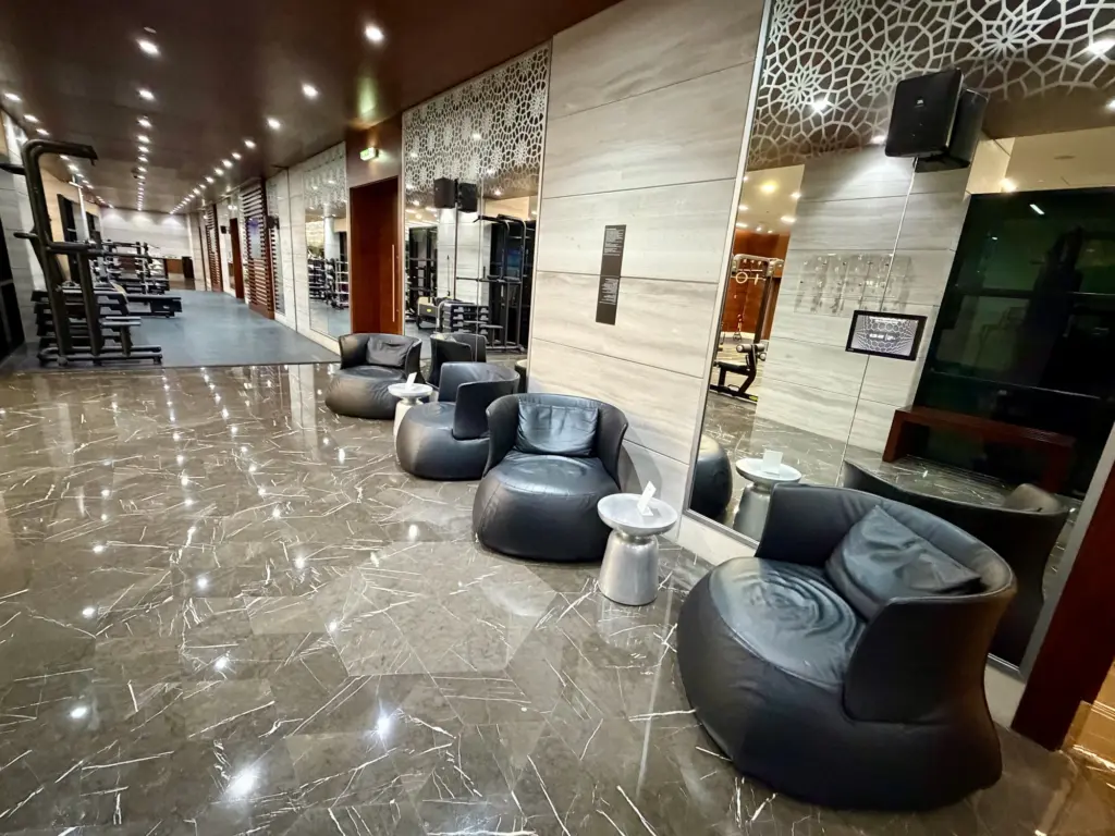 Seating inside the gym with more in the fitness center