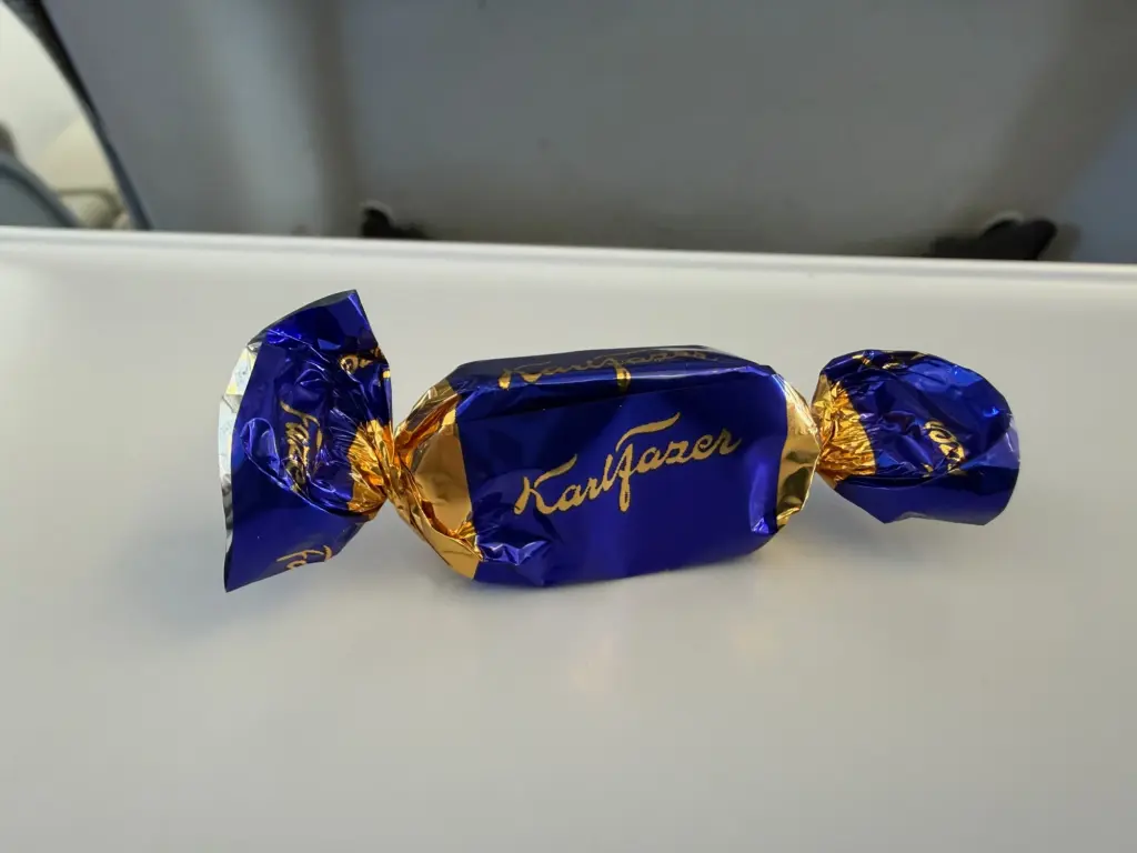 A tiny chocolate thats adored by an entire nation A tiny chocolate thats adored by an entire nation