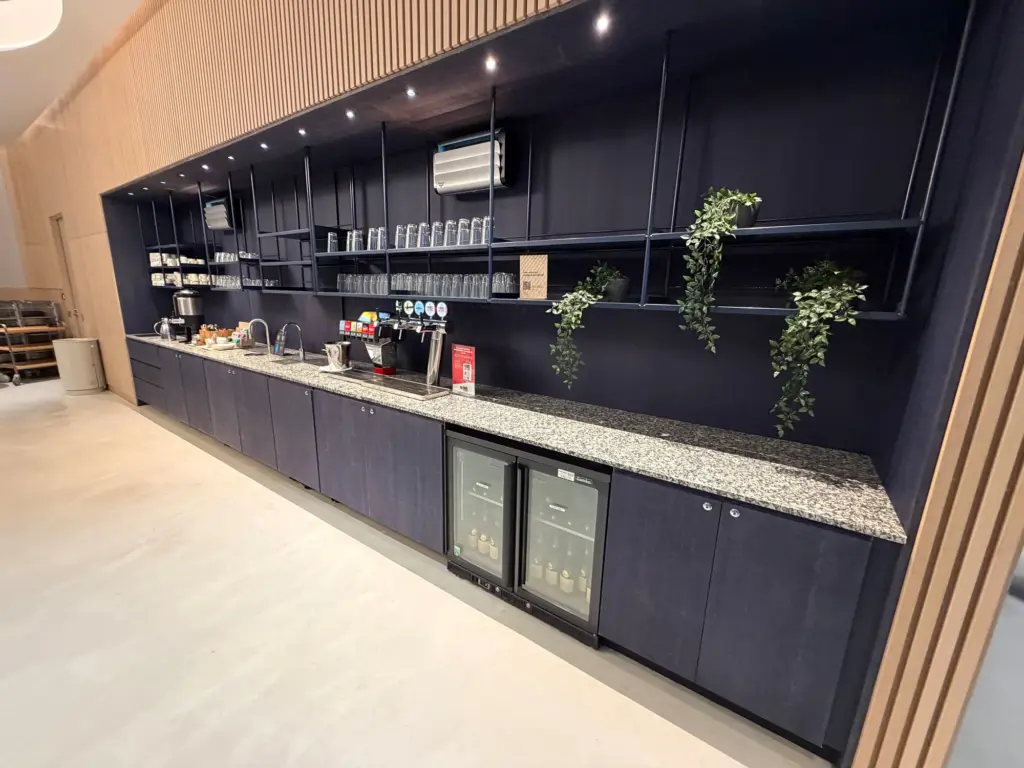 The self service drinks area the first food and beverage area youll see as you enter but not the last