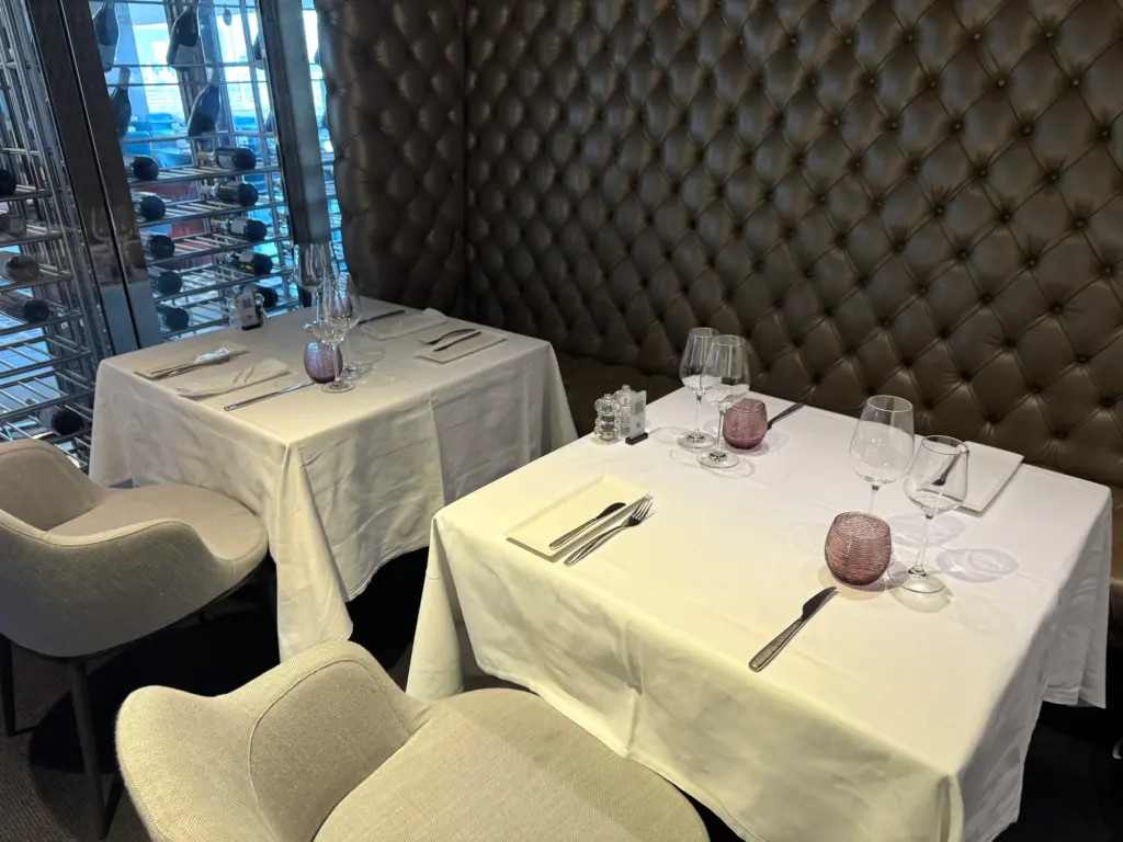 Formal sit down dining with well laid out tables