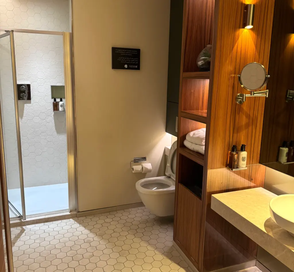 The shower room with the shower itself A classy space