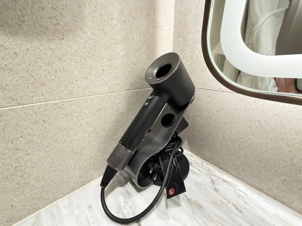 A Dyson Supersonic comes with the room A Dyson Supersonic comes with the room