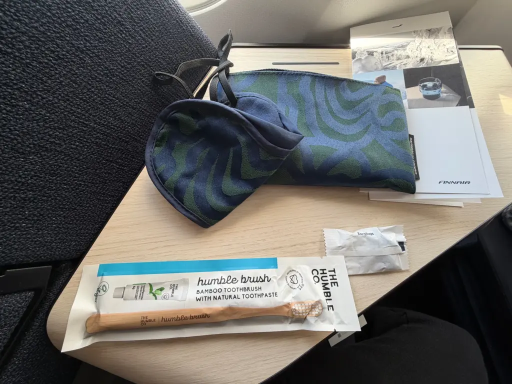 Inside a toothbrush earplugs and an eye mask Inside a toothbrush earplugs and an eye mask