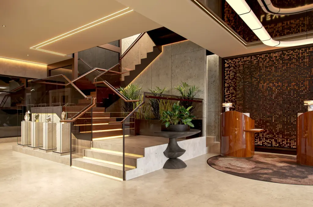 The lobby of the new Aspire lounge and the stairs that take you up to the lounge on the first floor