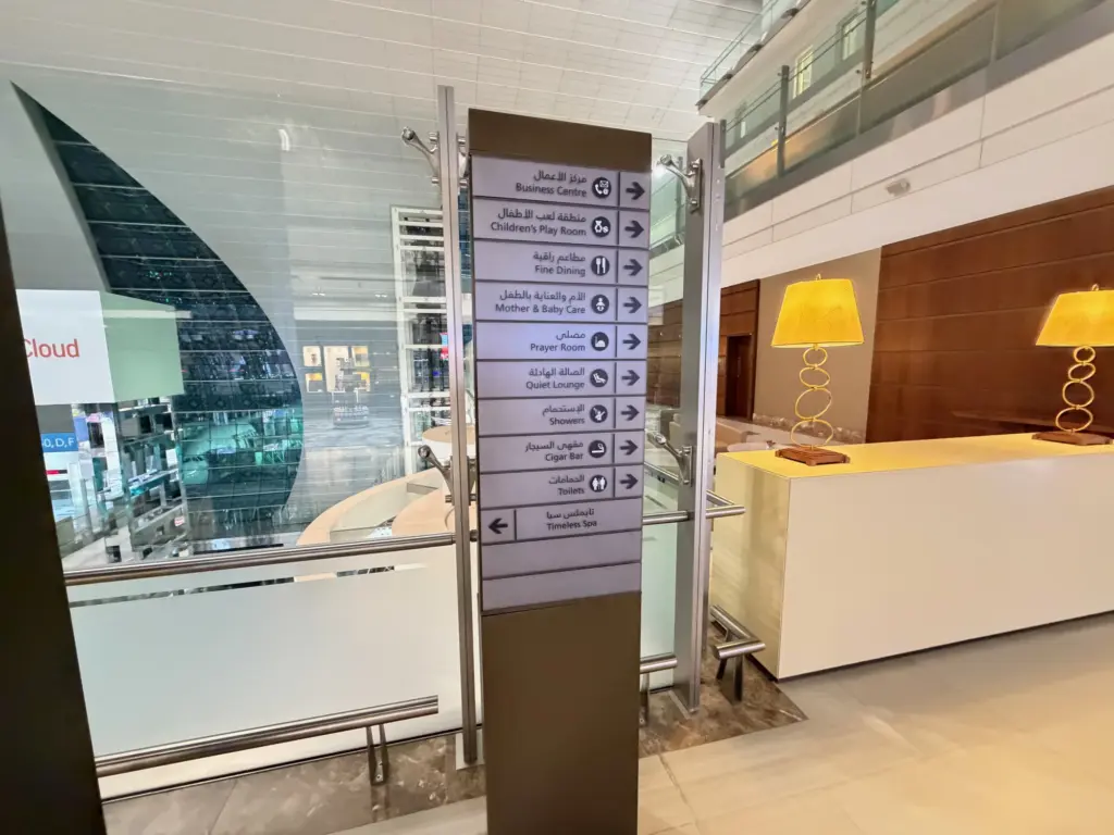 A lounge so big that it needs a signpost A photograph showing a signpost within the Emirates First lounge