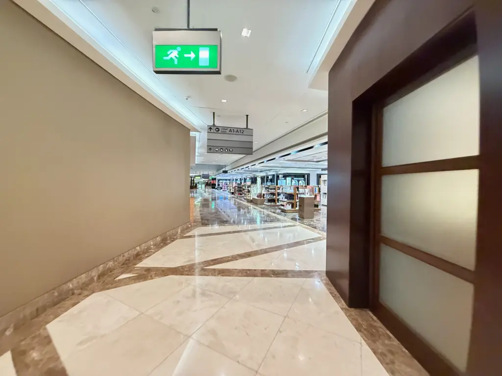 The entrance to one side of the lounge after you pass through reception The entrance to the (right hand side) of the lounge