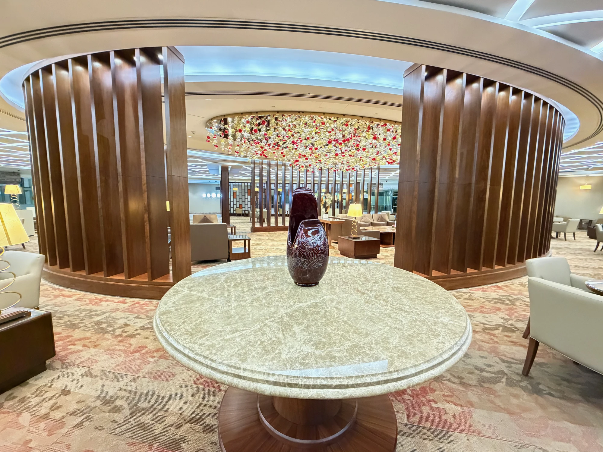 The stunning bar area at the far right of the lounge Not a single person was in there A photograph of the bar inside the Emirates First lounge in Concourse A