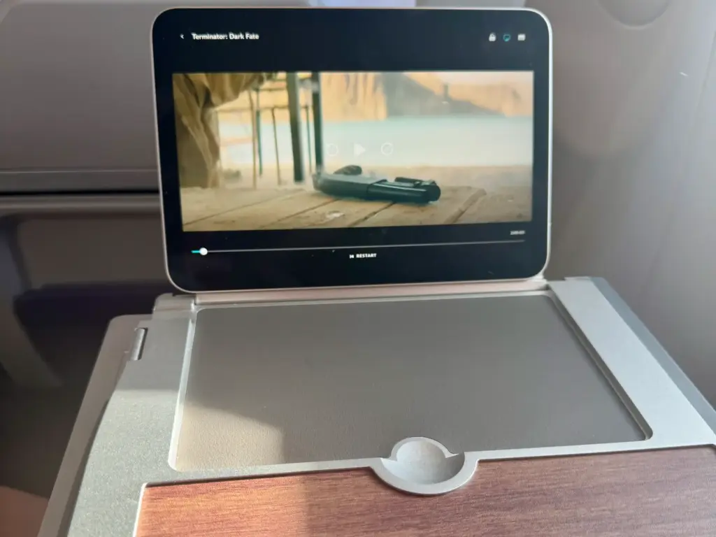 The tray table in business class and iPad holder