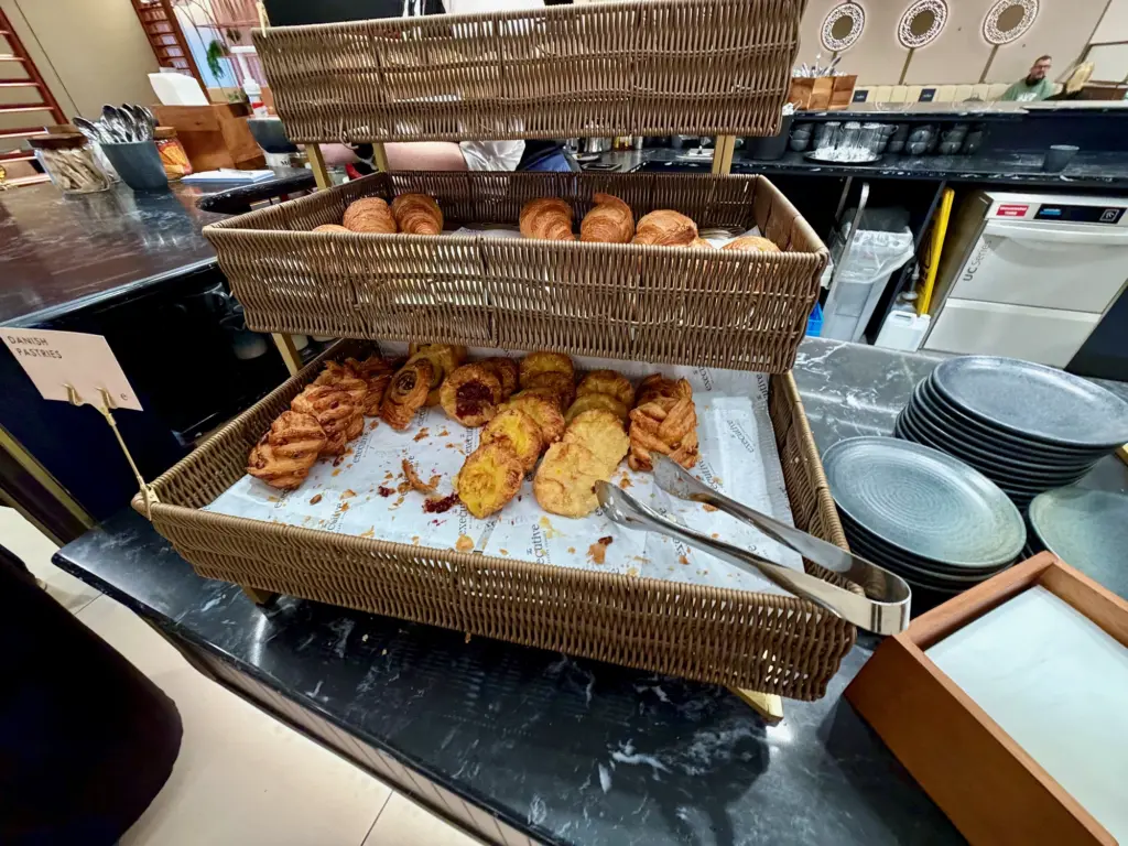 A photograph of the pastries available in the lounge