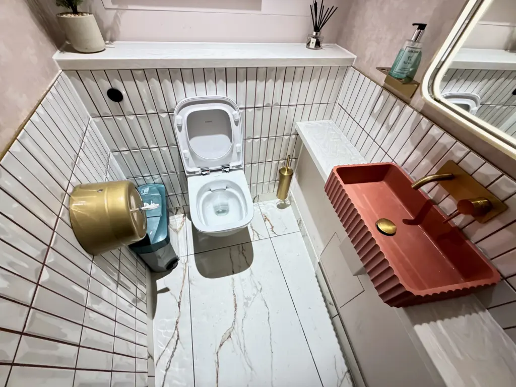 A photograph of a bathroom inside The Executive by Escape lounge