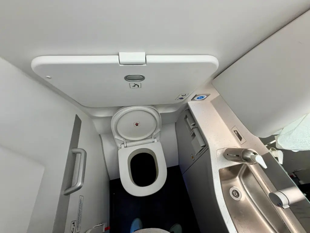 The Lufthansa A320 bathroom at the front of the plane A photograph of a bathroom aboard a Lufthansa A320