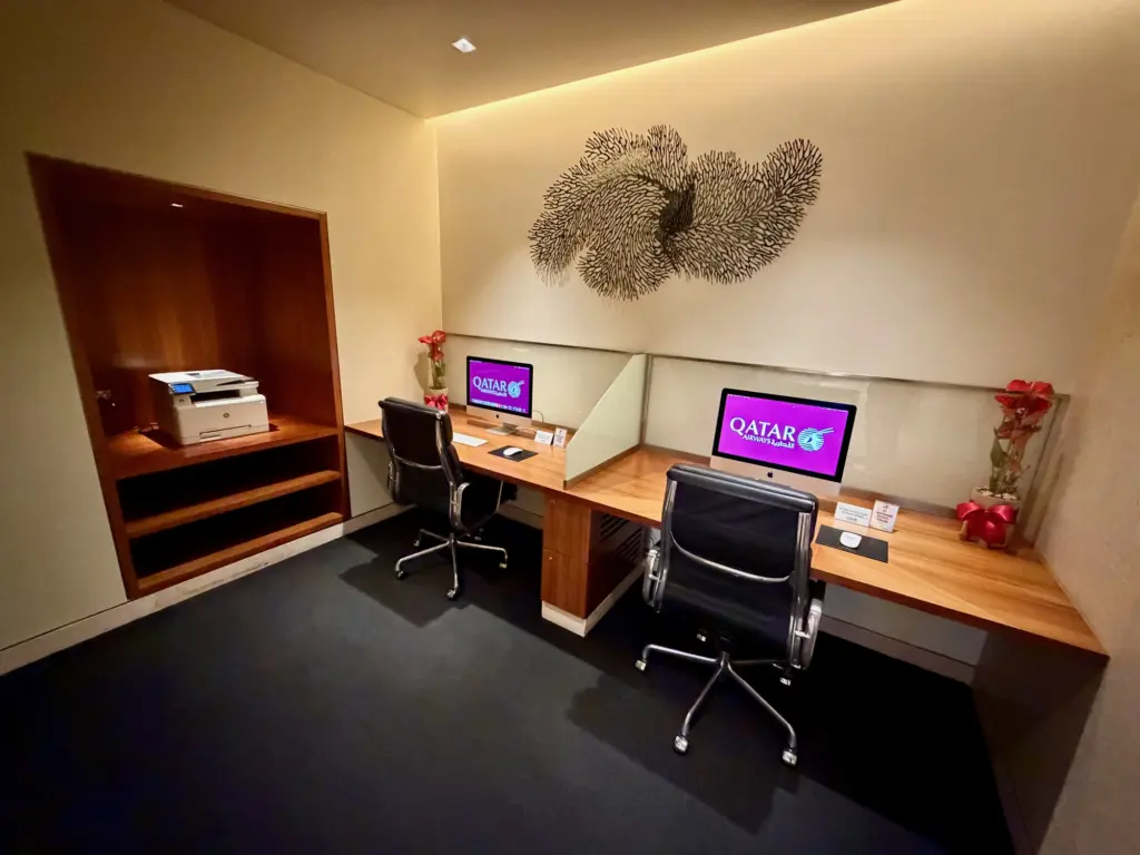 The business centre small but with Apple hardware and a printer A photograph of the business centre in the lounge