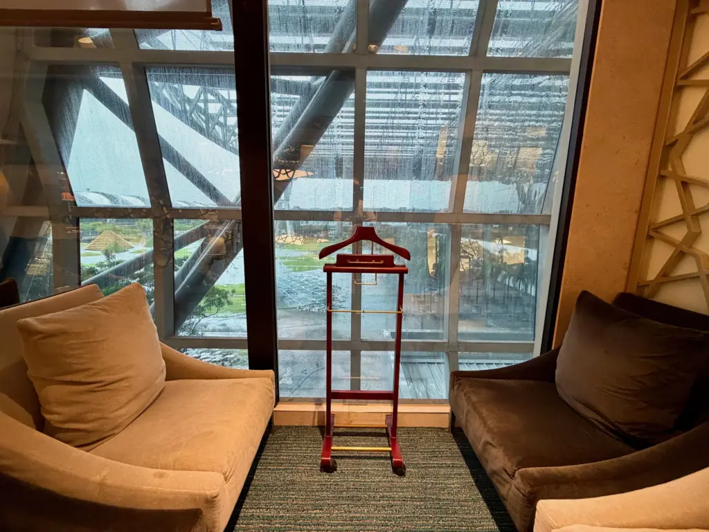 Theres a good level of natural light in the lounge thanks to the floor to ceiling windows along one wall A photograph of the windows inside the lounge