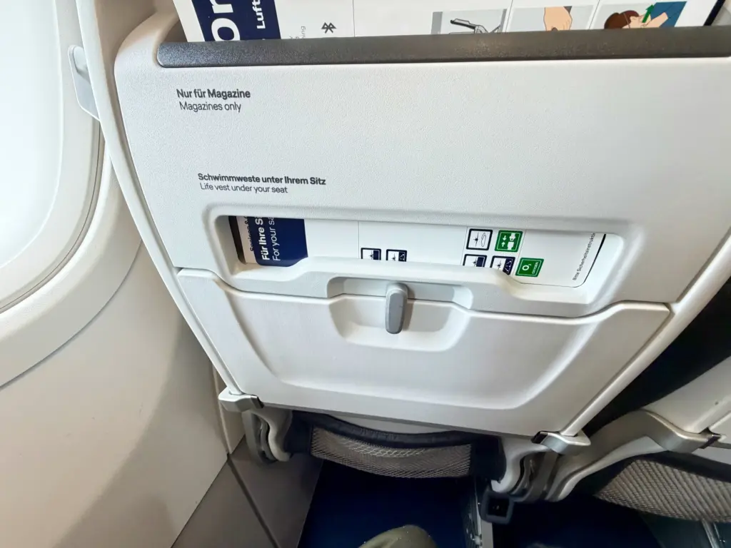 My seat for just under two hours It was perfectly pleasant A photograph of the back of a seat on a Lufthansa A320