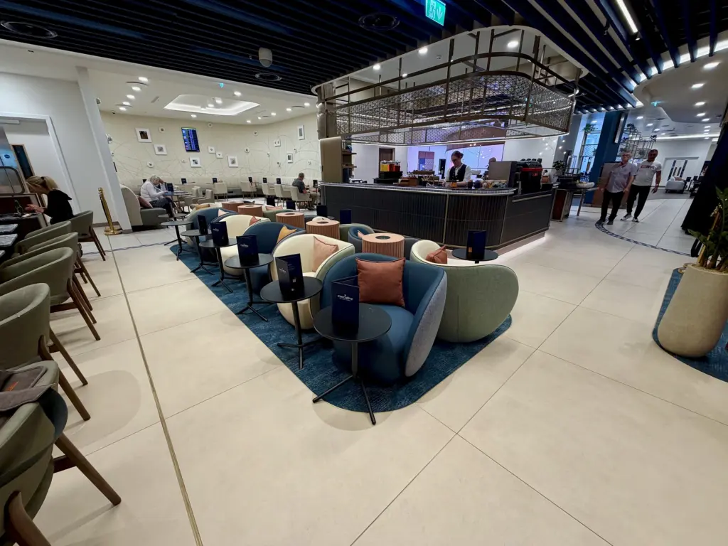 A photograph showing the Barista coffee station and seating around it