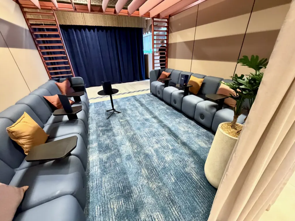 A photograph of a semi-private seating pod