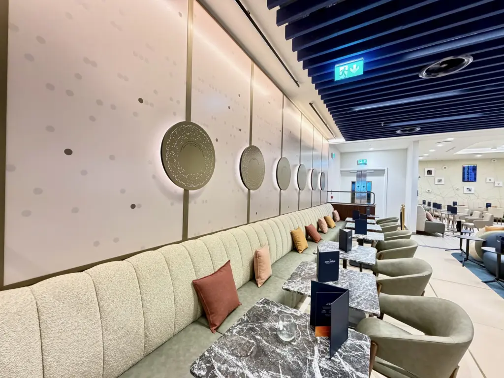 A photograph of the restaurant style seating, and the attractive wall decor